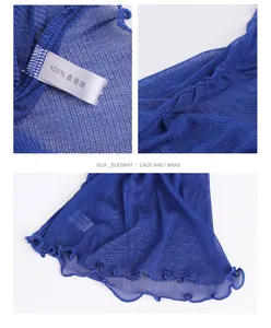 Detail of royal blue mulberry silk mesh fabric with fine knit and ruffled wavy edges