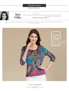 Detailed close-up of Bohemian paisley print on a summer silk knit top with round neckline
