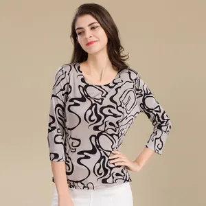 Women's silk knit top with abstract print and three-quarter sleeves in warm grey