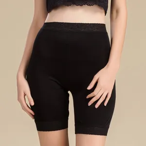 Women's black silk knit shorts with elegant wide lace waistband and floral hem detailing