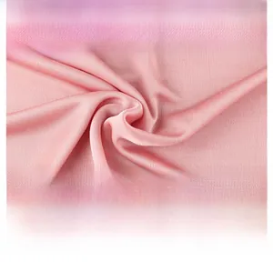 Detail showing high-quality mulberry silk knit fabric texture in soft pink