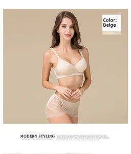 Detailed view of beige silk seamless panties with lace trim on a model in a studio setting
