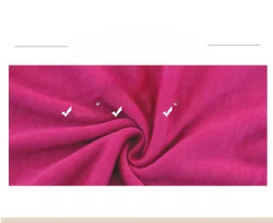 Detailed macro view of the dark pink pure wool knit fabric showing soft thermal texture