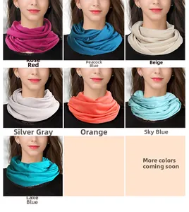 Detail view of seven color options for this knitted wool scarf with draped neck styling