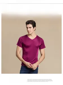 Detail of burgundy V-neck silk blend t-shirt on a 189cm model showing the slim fit texture