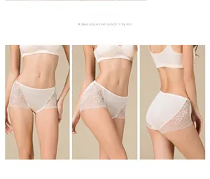 Close-up of silk women's panties with wide lace edges and breathable hollow design