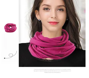 Macro detail of elastic magenta wool knit neck gaiter with premium stitched texture