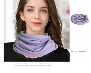 Detail of light purple knitted wool snood showing soft natural texture and ribbed layers
