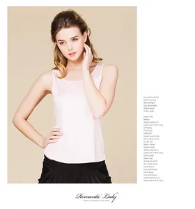 Detail of soft pink silk tank top with seamless knitted texture and slim fit design