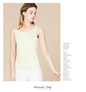Detail view of a premium sleeveless silk tank top in soft cream with a smooth finish