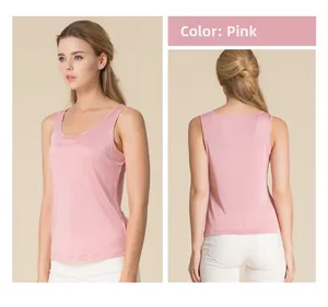 Detail view of dusty rose silk vest showing front and back texture with subtle sheen