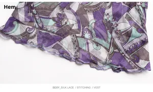 Detail of a ruffled lettuce hem on a breathable purple mesh silk neck gaiter