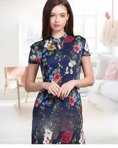Detail of floral silk qipao dress with standing collar and teardrop neckline cutout