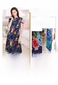 Detail of silk cheongsam dress showing floral print and traditional Mandarin collar