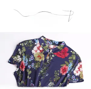 Close-up of classic mandarin collar and floral silk knit fabric on navy cheongsam dress
