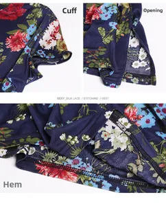 Detailed close-up of the floral print silk dress showing cuffs, hem and side slit design