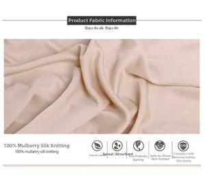 Macro texture of 100% mulberry silk knit fabric showing soft sheen and breathable mesh