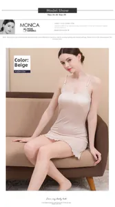 Detail of beige silk knit chemise nightgown with elegant wavy ruffle hem on a model