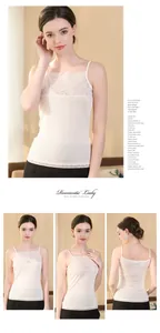 Detail view of beige silk camisole featuring delicate floral lace trim and slim straps
