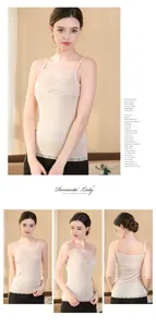 Detailed close-up of champagne silk camisole with elegant lace trim and slim straps