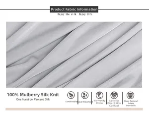 Detail of silver-grey 100% mulberry silk knitted fabric showing natural texture and soft sheen