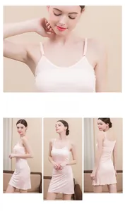 Detailed views of a light pink silk nightdress with thin straps and ruffled hem design