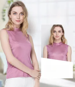 Close-up detail of 100% mulberry silk fabric on a sleeveless mock neck slim-fit top
