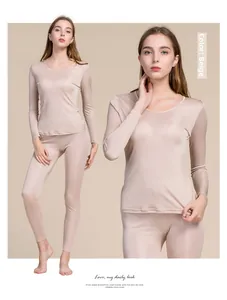 Women's silk thermal underwear set in beige featuring a long-sleeve top and leggings