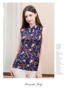 Detail of silk-like floral print sleeveless top with vintage mock neck and slim fit cut
