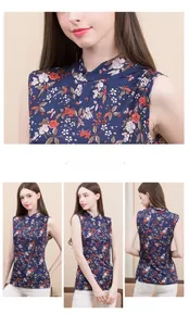 Close-up of high collar and floral print detail on navy silk knitted sleeveless top