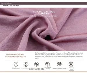 Detail of pink silk knit fabric showing breathable and moisture-wicking texture