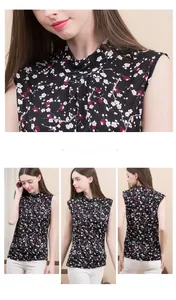 Detail of silk knit floral top featuring a high neck with pleated texture and print