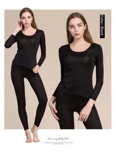 Women's premium silk thermal underwear set in black color with a soft round neckline