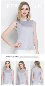 Detailed views of silver-grey mock neck silk tank top showing fit and luxurious texture