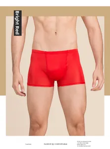 Gros plan du boxer pour homme en soie rouge vif montrant la texture et les coutures