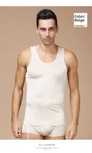 Detail view of men's beige silk knit undershirt and matching boxers set on a model