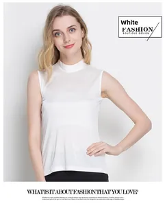 Detail view of white silk sleeveless vest with sleek knit texture and slim fit design