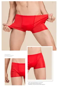 Vue détaillée du boxer en soie rouge élastique avec des coutures de haute qualité pour hommes