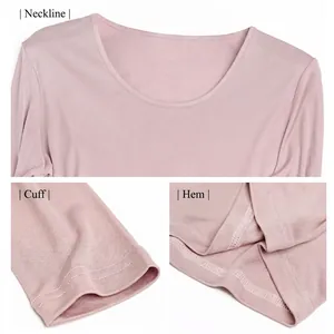 Women's silk thermal underwear set in pale pink with knit texture and round neckline