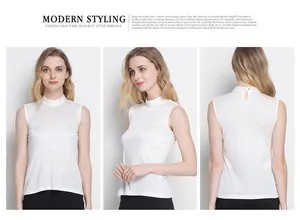 Detail of white silk sleeveless top showing high neck design and back button closure