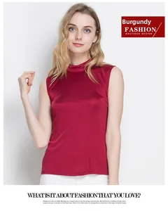 Detail of elegant wine red silk knit sleeveless top with high neck and satin finish