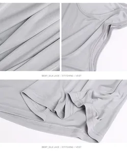 Detail of grey silk vest showing smooth knit fabric texture and high-quality stitching