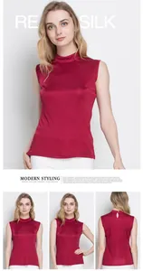 Detailed back view of a slim-fit burgundy real silk top featuring a teardrop cutout design