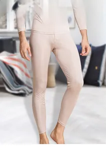 Detailed close-up of men's silk knit thermal pants with elastic waistband and fly detail
