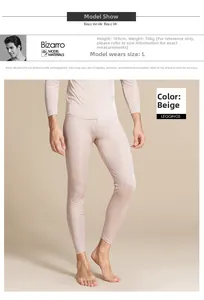 Detailed view of beige silk knit thermal leggings for men with model height 189cm