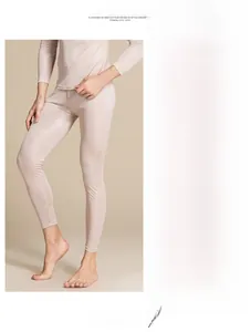 Detailed texture of men's silk thermal underwear set in elegant champagne beige