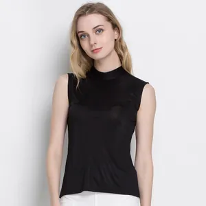 Women's black sleeveless mock neck silk tank top with a slim fit and smooth knit texture