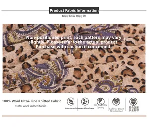 Detail of 100% pure wool sweater fabric with leopard and paisley print texture