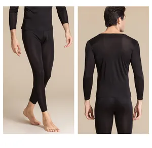 Detail view showing slim fit men's silk thermal leggings with seamless elastic finish