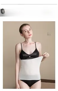 Elastic white seamless silk waist warmer wrap shown on a model with stretch detail